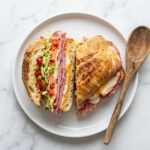 Toasted Italian Sandwich Recipe - Toasted Italian Sandwich Recipe served in a white bowl overhead view