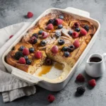 Croissant French Toast Bake with Vanilla Custard & Fresh Berries Recipe, easy croissant French toast bake recipe, homemade vanilla custard French toast bake, best croissant French toast bake recipe, how to make croissant French toast bake